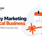 Holiday marketing cover with a gift card, calendar and evergreen sprig